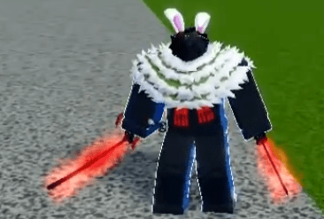 A player holding the CDK in Blox Fruits