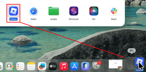 Dragging the Roblox app to the bin in Mac
