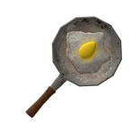 burned egg on a frying pan