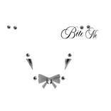 face piercing set w white bow & tattoo