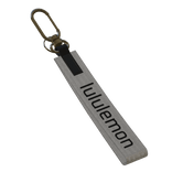 White Lululemon KeyChain