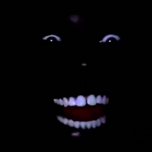 Black Man Laughing at Dark